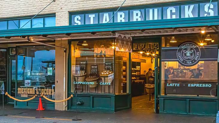 A Starbucks shop with a green front