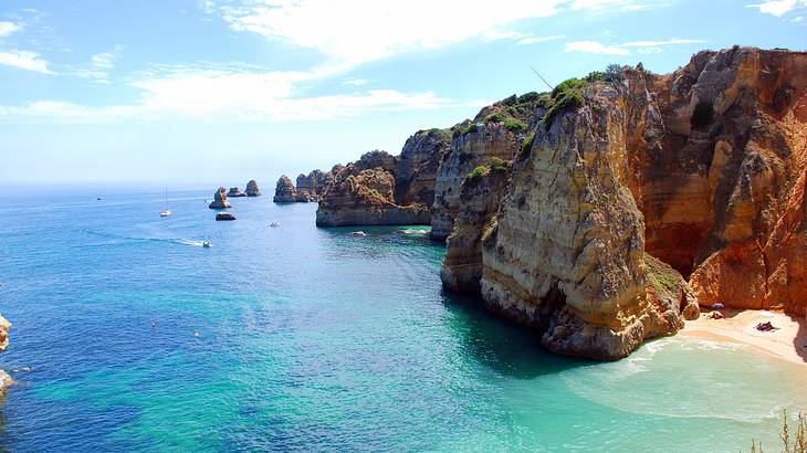 Cliffs near the turquoise ocean under a blue sky