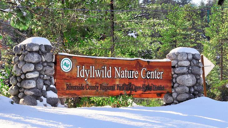 An entrance sign saying "Idyllwild Nature Center"