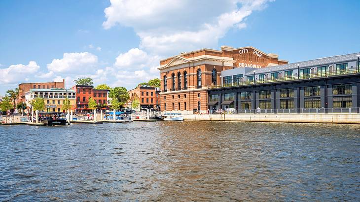 A body of water near a port and old buildings