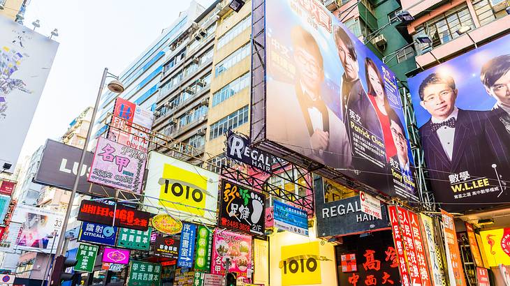 Tall buildings and shop signs at Tsim Sha Tsui