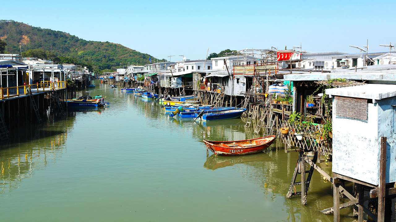 Stilt houses on water with boats, Lantau Island, Hong Kong