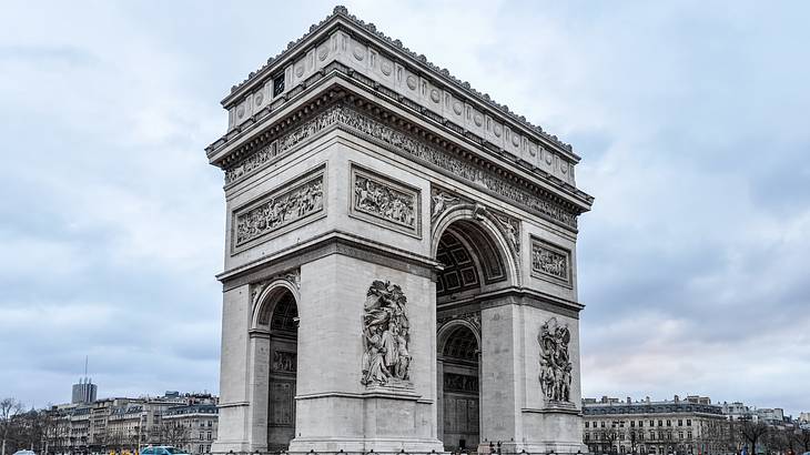 A shot of the Arc de Triomphe from the outside of the famous roundabout, Paris