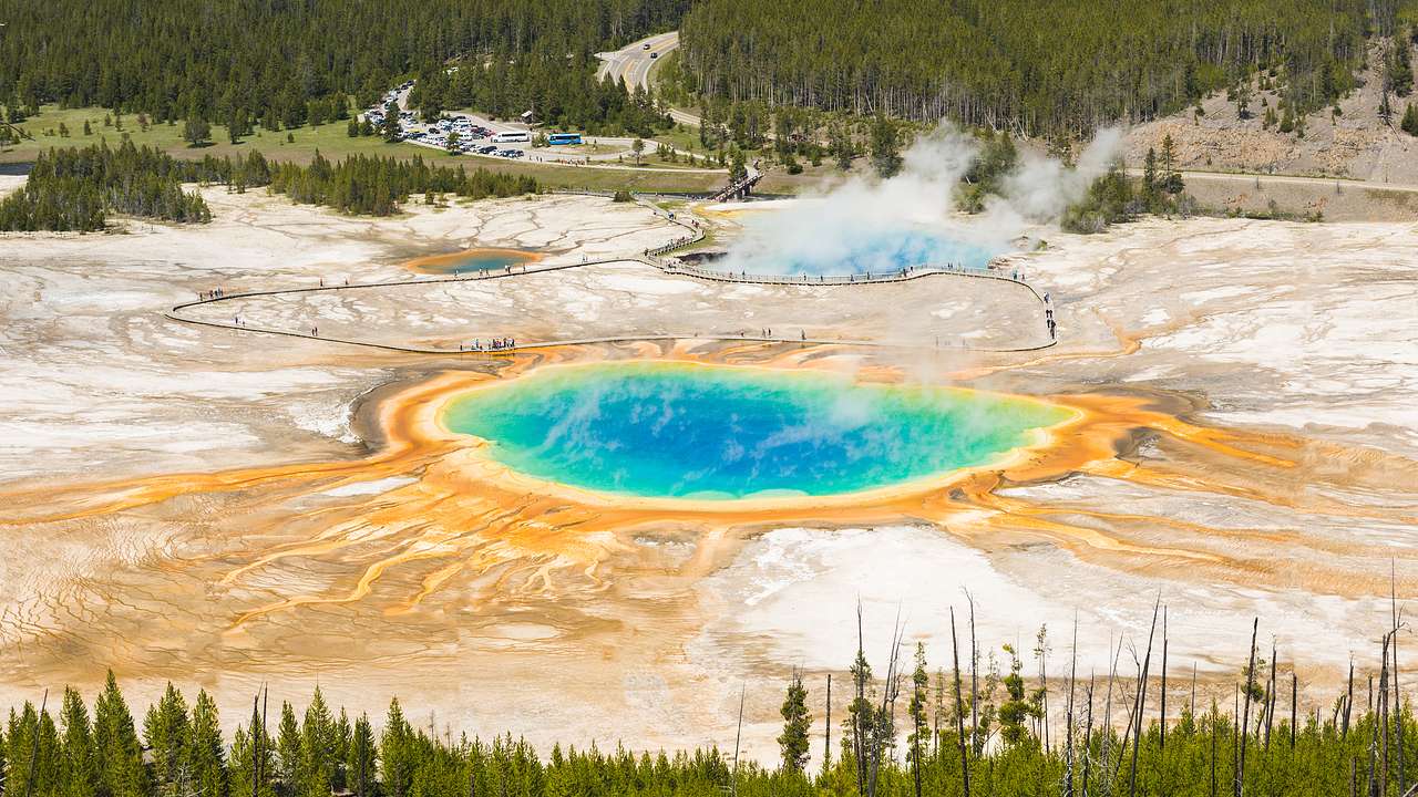 The blue Grand Prismatic Spring in Yellowstone is one of the famous US landmarks