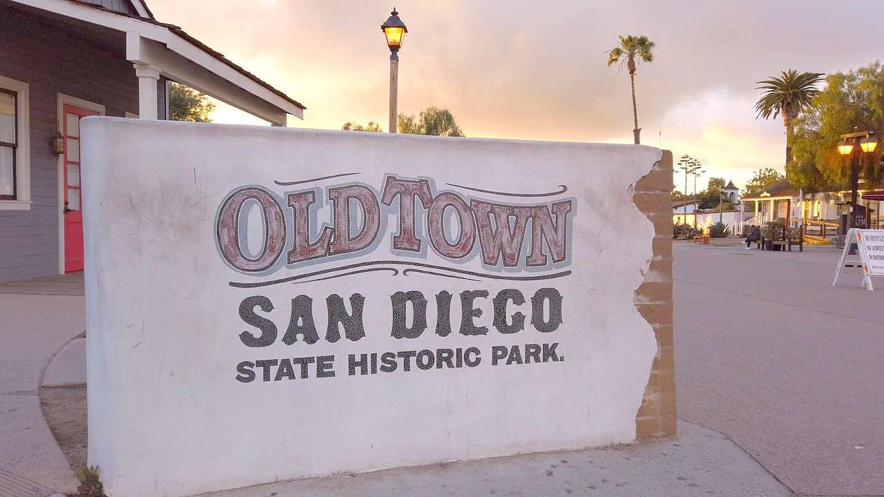 A concrete sign that says "Old Town San Diego State Historic Park"
