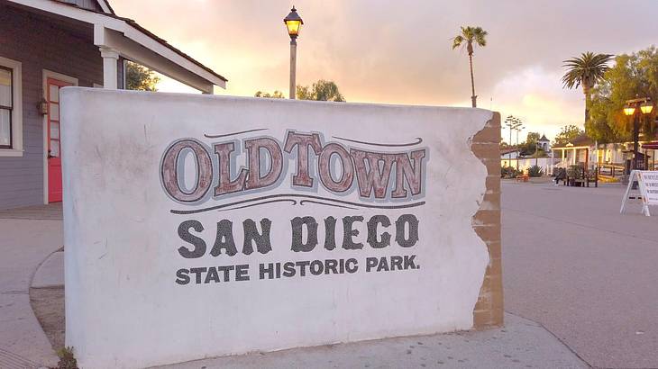 A concrete sign that says "Old Town San Diego State Historic Park"