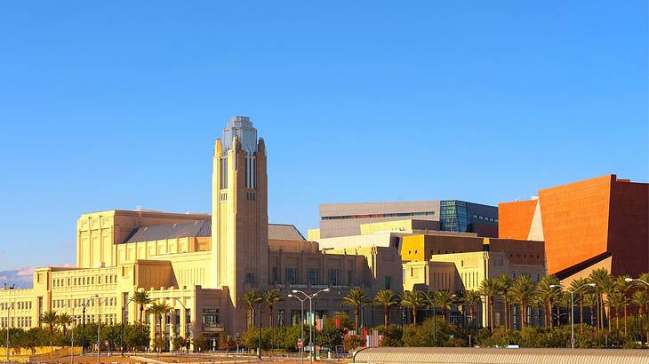 A building with a tower under a blue sky