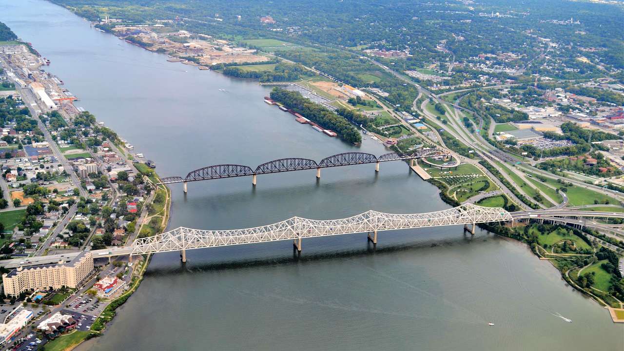 An aerial shot of two bridges connecting two separate land areas