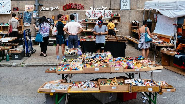 A flea market with stalls and people shopping