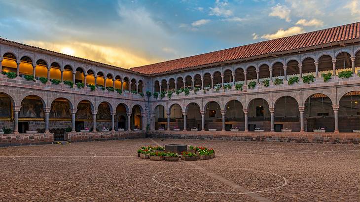 The interior courtyard of a multi-arched palace building