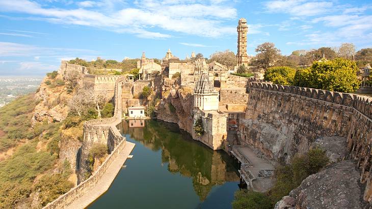 A massive fort complex with a body of water in the middle from above A massive fort complex with a body of water in the middle from above