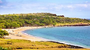 The crescent-shaped Hulopoe Beach is one of the famous landmarks in Lanai, Hawaii
