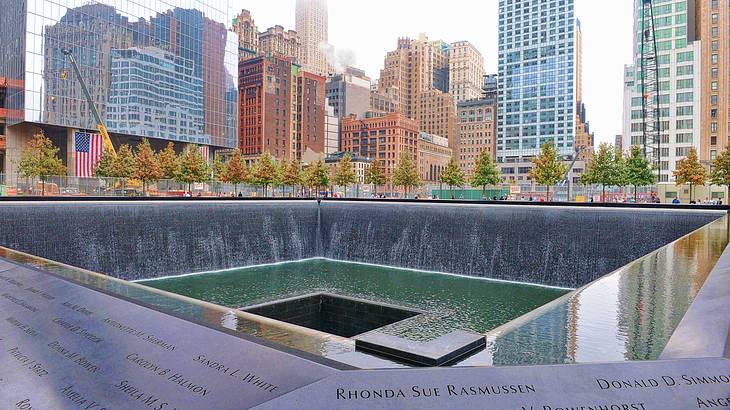 World Trade Center Memorial with a square fountain surrounded by names of victims