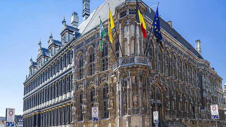 A unique town hall ornately decorated with a mix of Gothic and Renaissance style