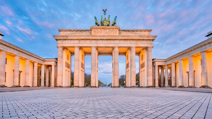 Neo-classical monument with columns and a chariot sculpture on top Neo-classical monument with columns and a chariot sculpture on top